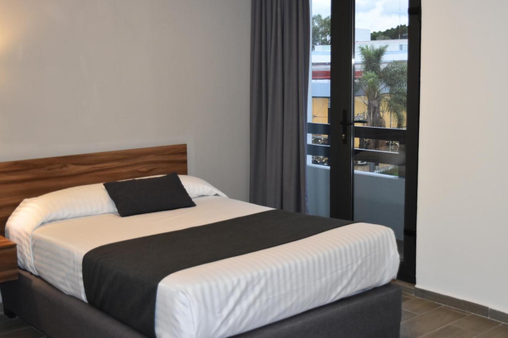 Estanza Hotel & Suites Morelia Szoba fotó